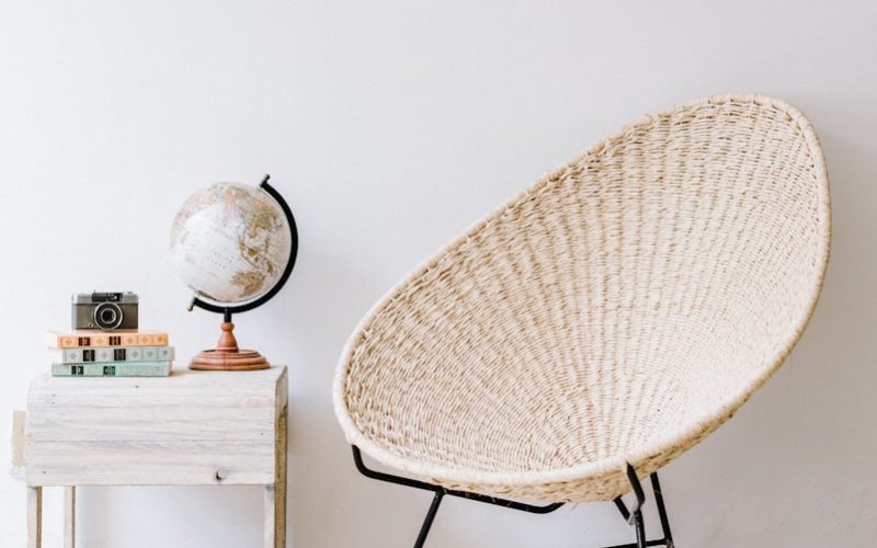 white and black chair beside white table